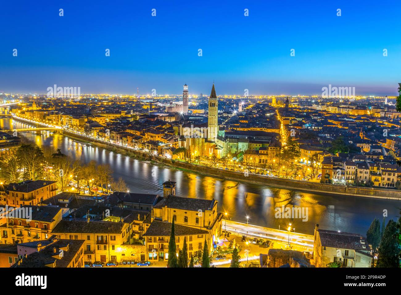aerial view of the italian city verona during sunset including church ...