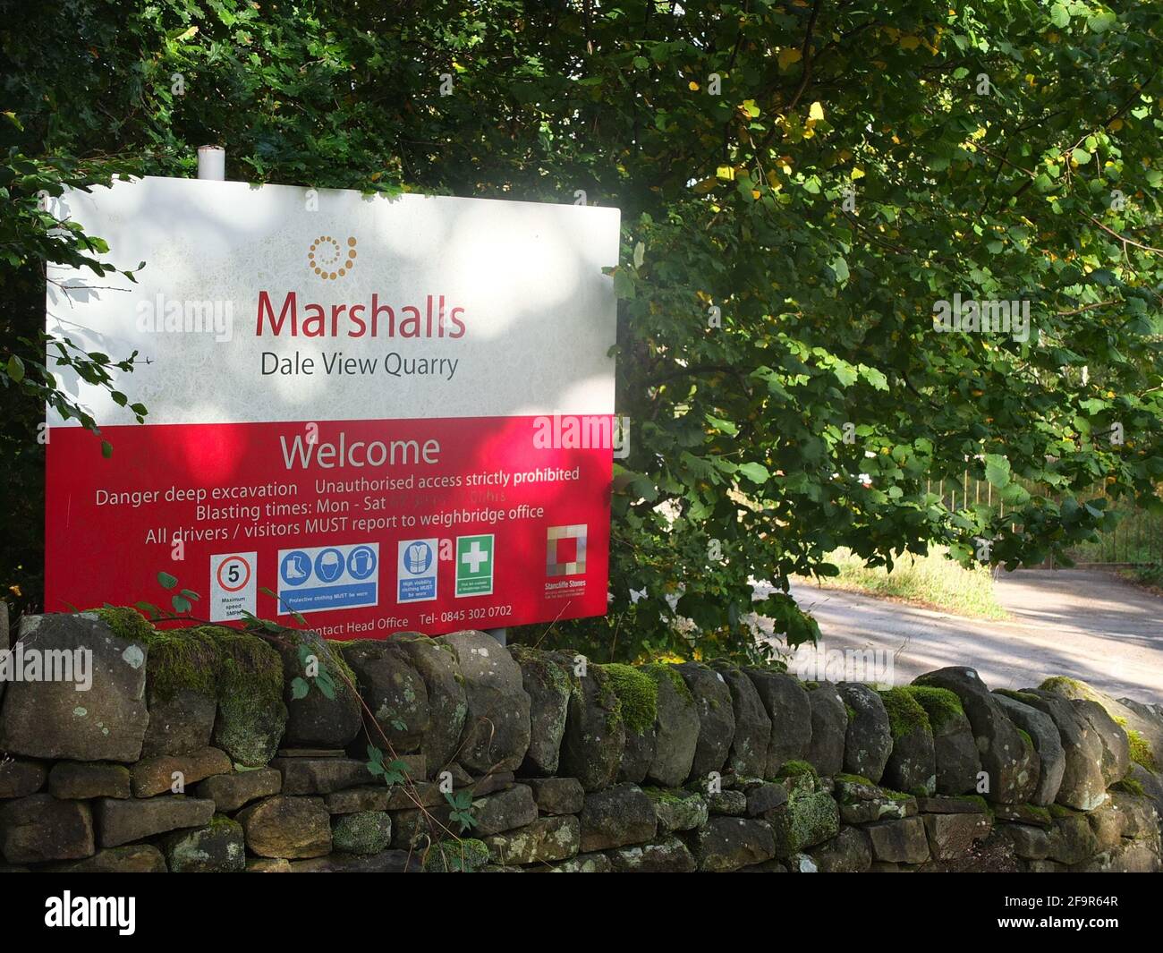 Sign for Marshalls Dale View Quarry at Stanton Lees in Derbyshire Peak District. Opened following protest in 2000s re quarry nearer to Nine Ladies. Stock Photo