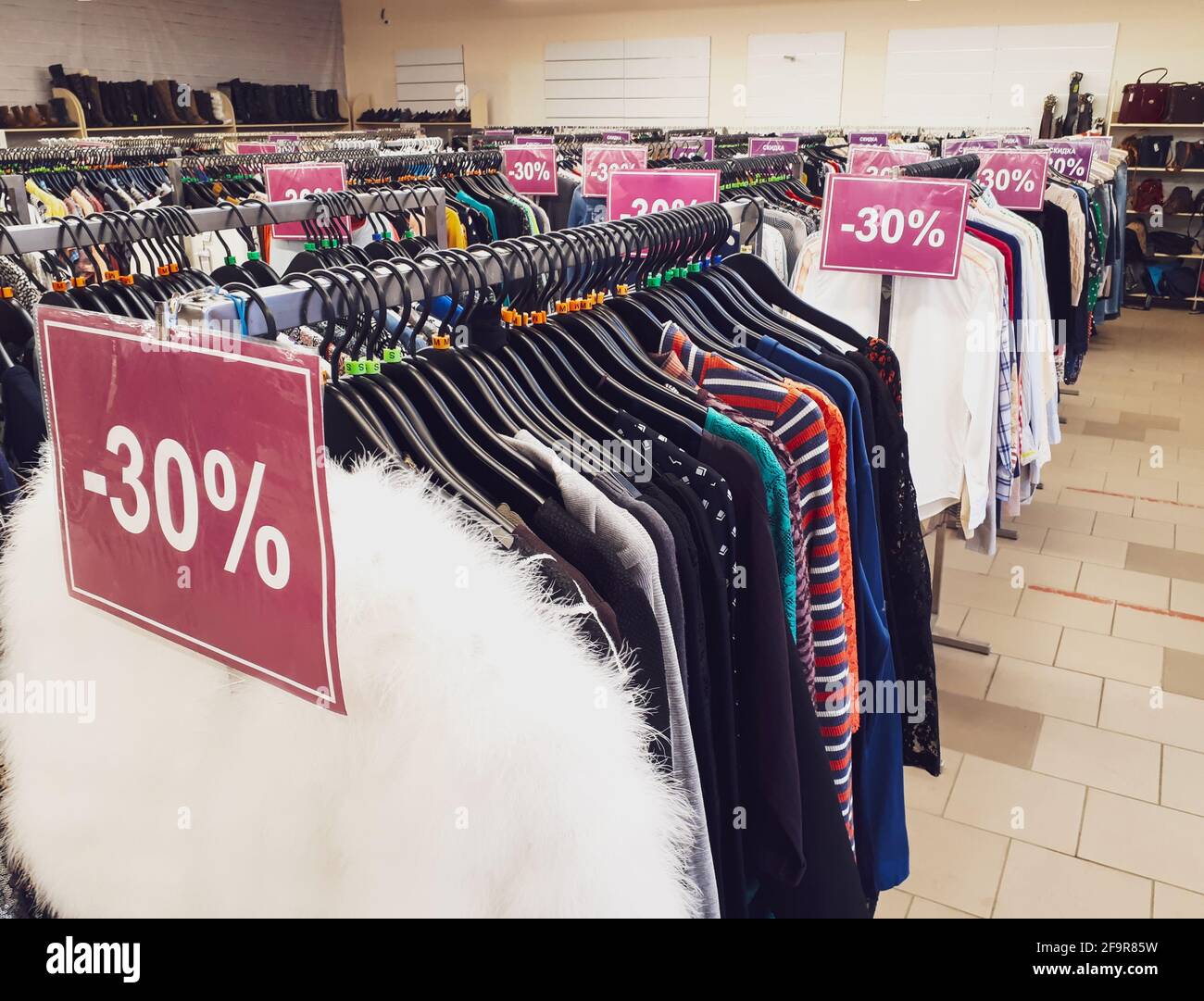 Seasonal sale in a clothing store Stock Photo Alamy