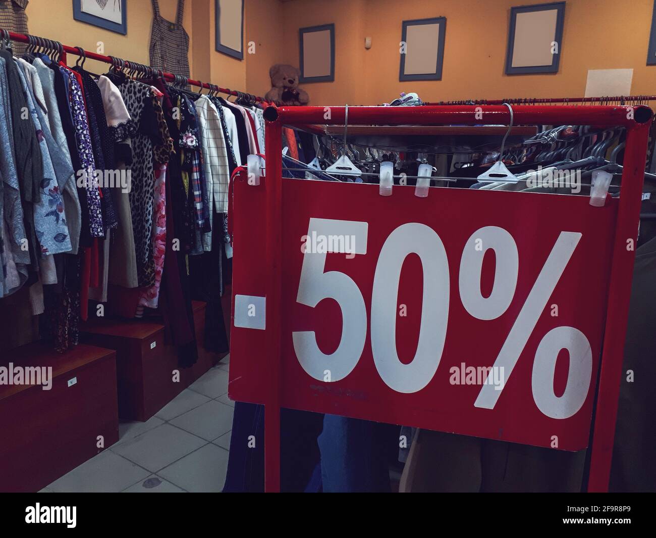 Seasonal sale in a clothing store Stock Photo Alamy