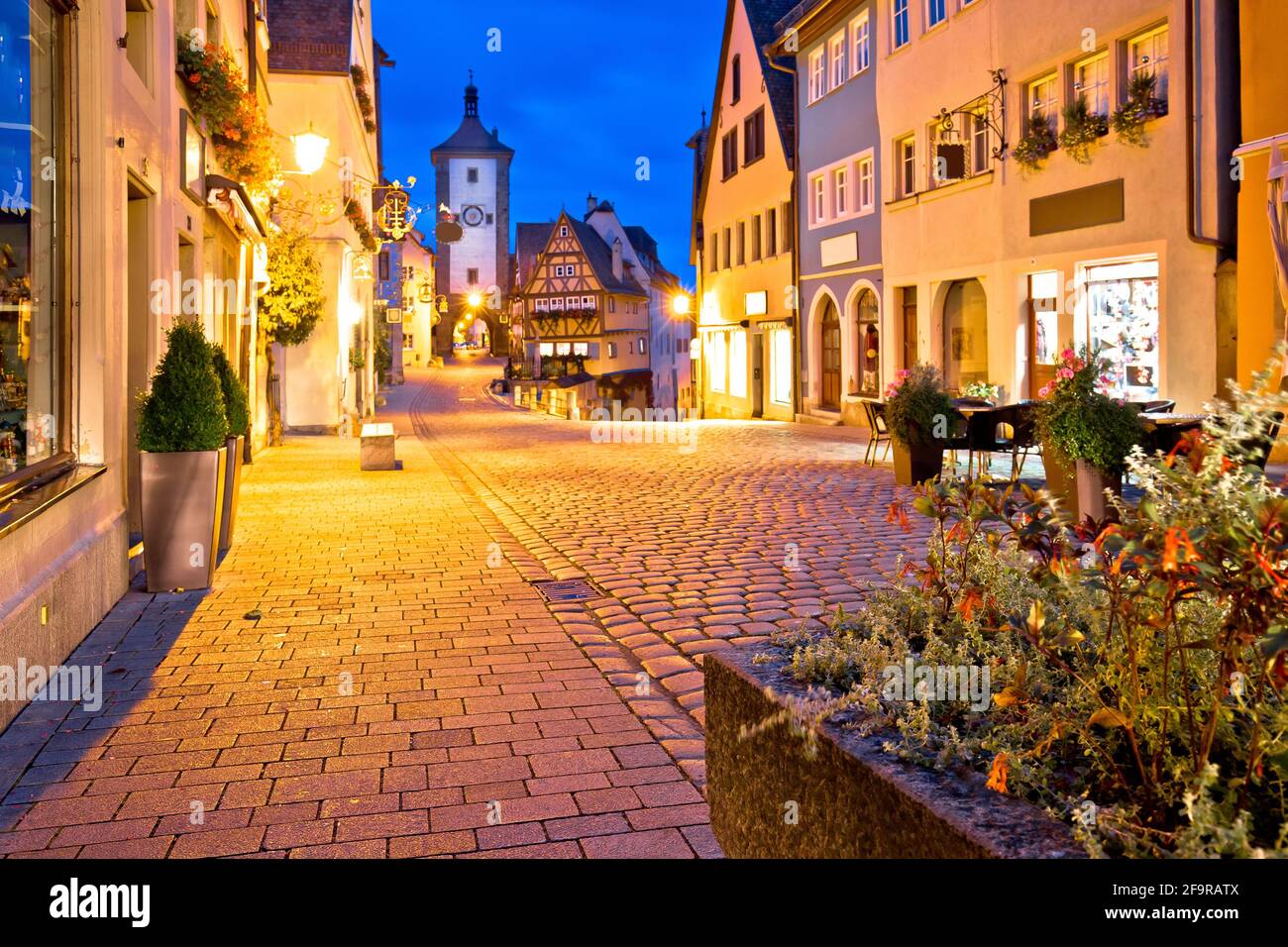 Cobbled street of historic town of Rothenburg ob der Tauber evening view, Romantic road of Bavaria region of Germany Stock Photo