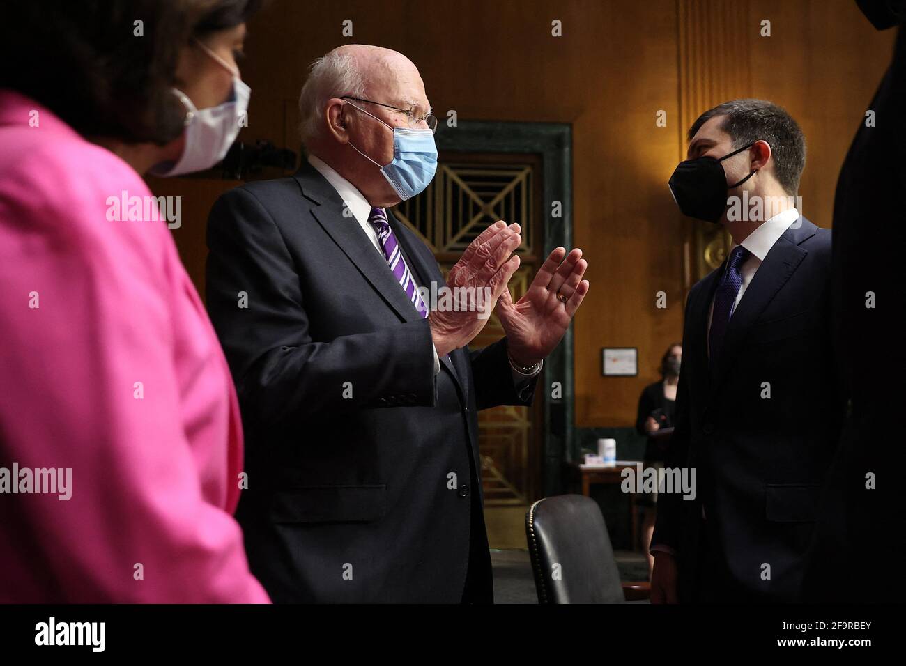 (L-R) Commerce Secretary Gina Raimondo, Senate Appropriations Committee Chairman Patrick Leahy (D-VT) and Transportation Secretary Pete Buttigieg talk before a committee hearing in the Dirksen Senate Office Building on Capitol Hill on April 20, 2021 in Washington, DC. Members of President Biden's cabinet are testifying about the American Jobs Plan, the administration's $2.3 trillion infrastructure plan that has yet to win over a single Republican in Congress. Photo by Chip Somodevilla/Pool/ABACAPRESS.COM Stock Photo