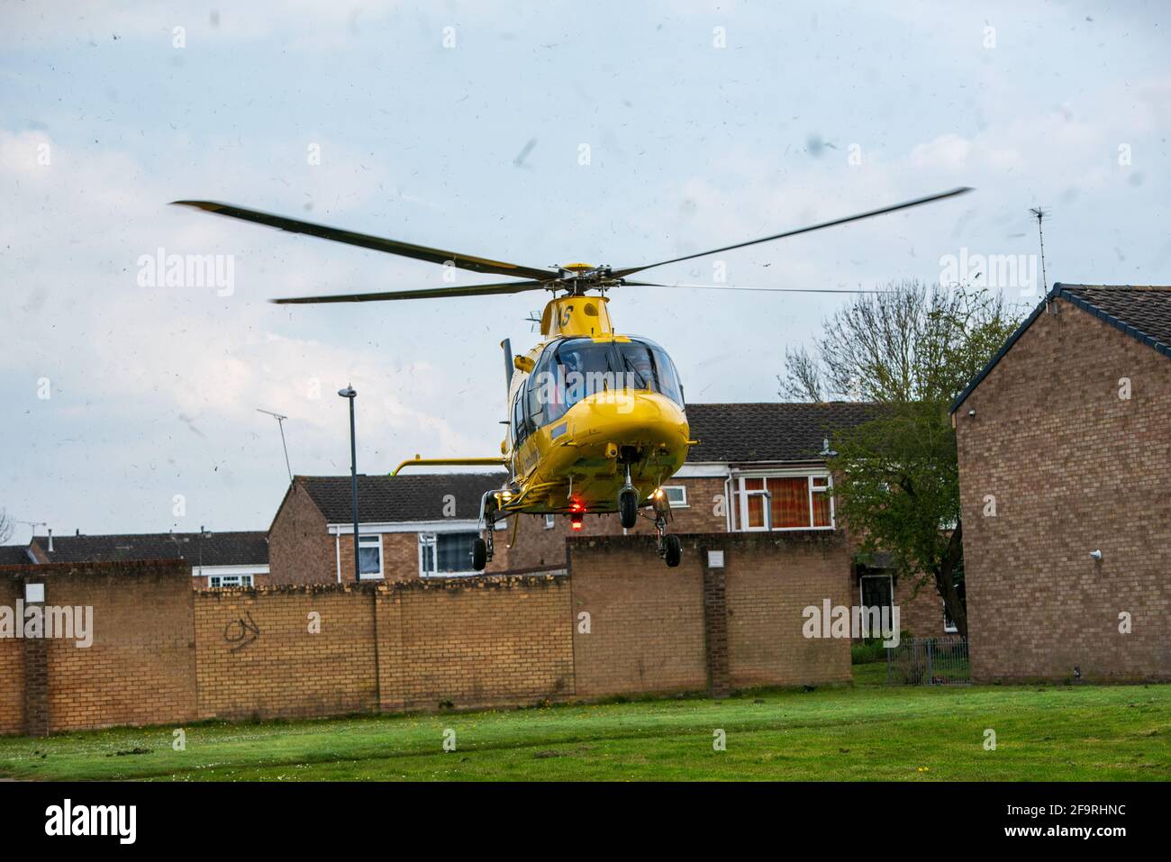Sydenham Estate, Leamington Spa, UK. 20th April 2021: Warwickshire and Northamptonshire Air Ambulance were scrambled to a crash on the junction of Gainsborough Drive and Sydenham Drive on the Sydenham Estate of South Leamington on Tuesday afternoon. A motorcyclist was involved, and it's understood the rider was conveyed to hospital via land ambulance. Credit: Ryan Underwood / Alamy Live News Stock Photo