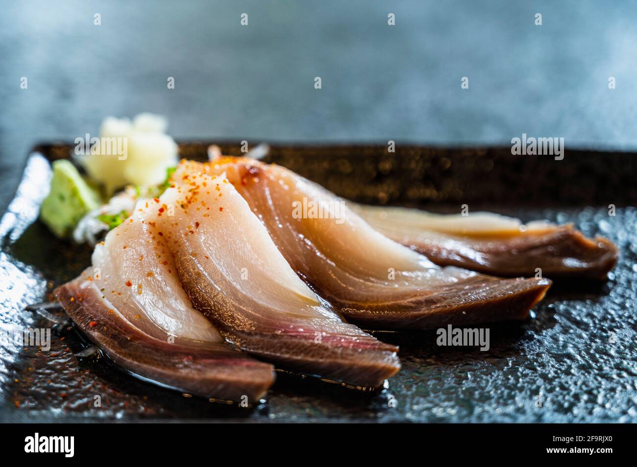 Hamachi or Amberjack sashimi at sushi bar in Northern Thailand Stock