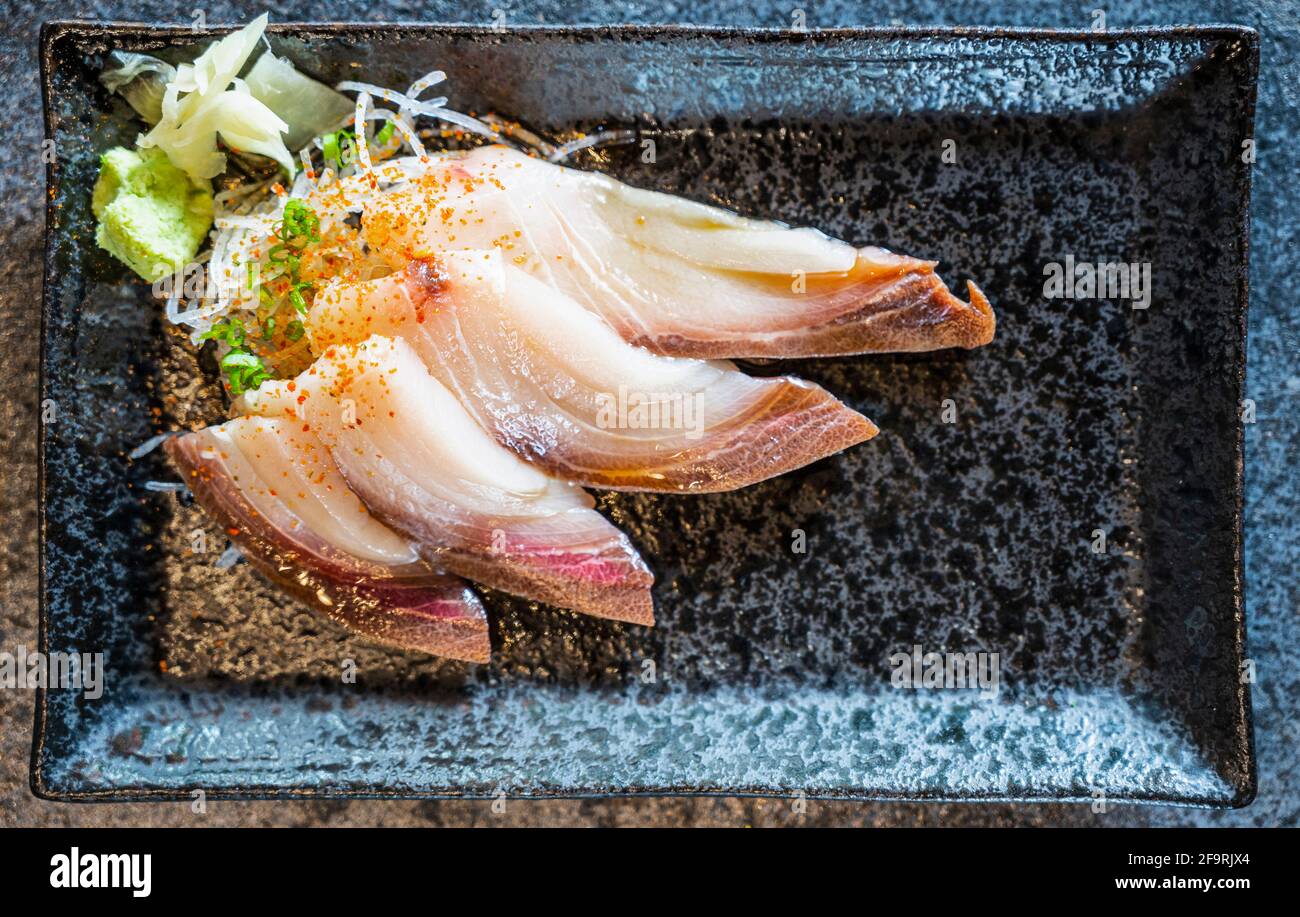 Hamachi or Amberjack sashimi at sushi bar in Northern Thailand Stock