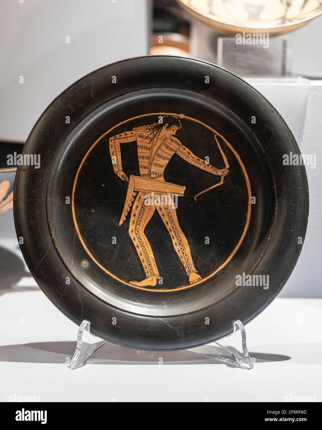 Rome. Italy. Attic red-figure plate, 490-480 BC. In the centre, an archer in Scythian costume. Centrale Montemartini Museum. Stock Photo