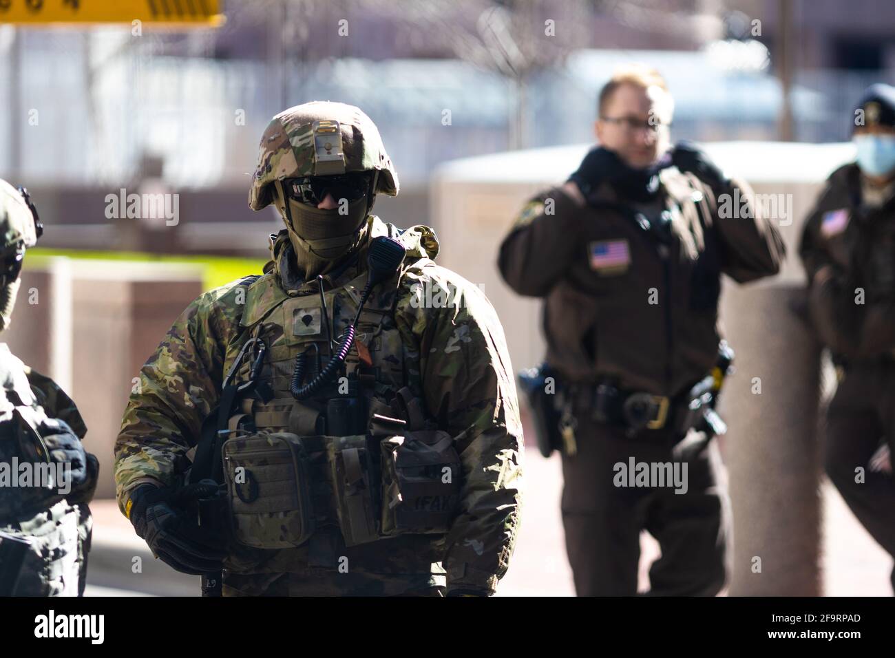 National Guard members and Hennepin County Sheriff Deputies are seen standing guard at the Hennepin County Courthouse in Minneapolis, Minnesota on April 20, 2021.  A verdict is anticipated as the jury deliberates in the trial of Derek Chauvin for the murder of George Floyd.  (Photo by Brian Feinzimer/Sipa USA) Stock Photo