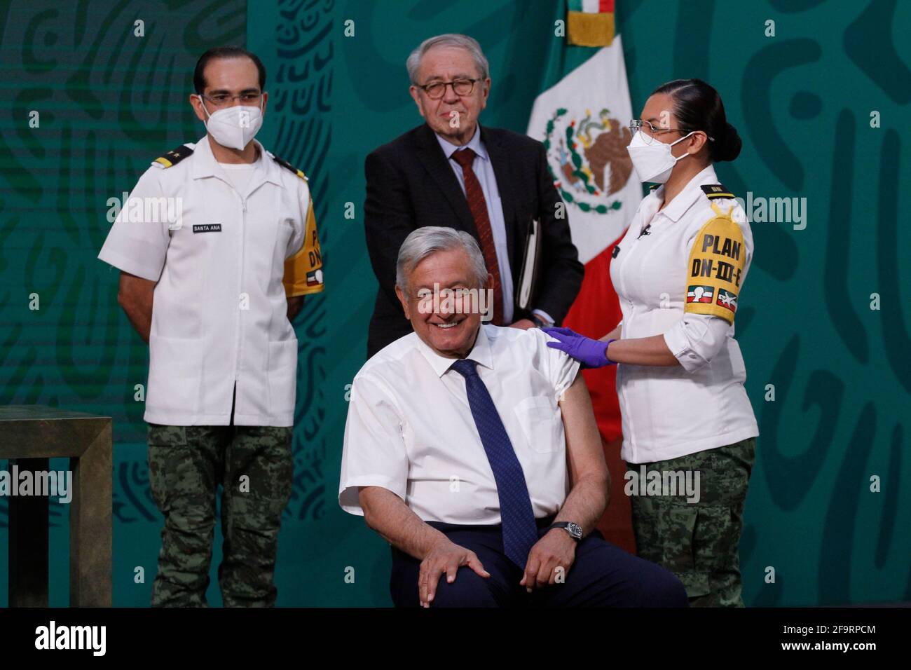 Non Exclusive: MEXICO CITY, MEXICO - APRIL 20: Mexico's Health Minister, Jorge Alcocer, observes while Mexico's President Andres Manuel Lopez Obrador, Stock Photo
