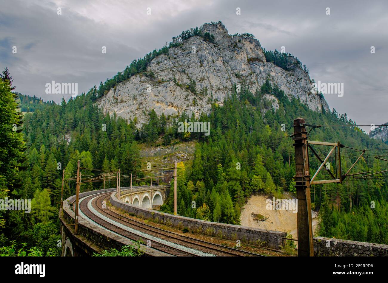 view of a railroad bridge of the semmeringbahn railway in austria which ...
