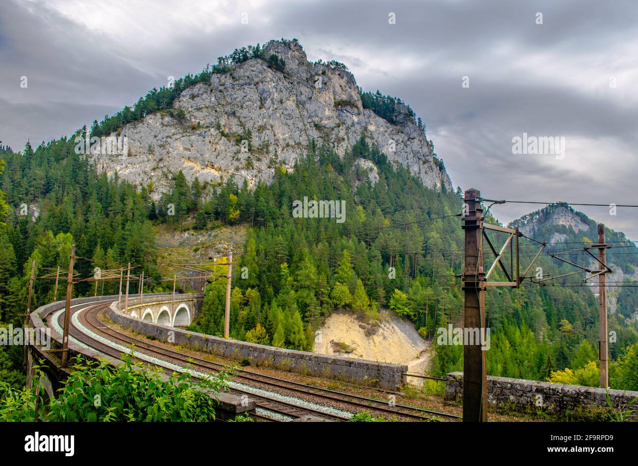 view of a railroad bridge of the semmeringbahn railway in austria which ...