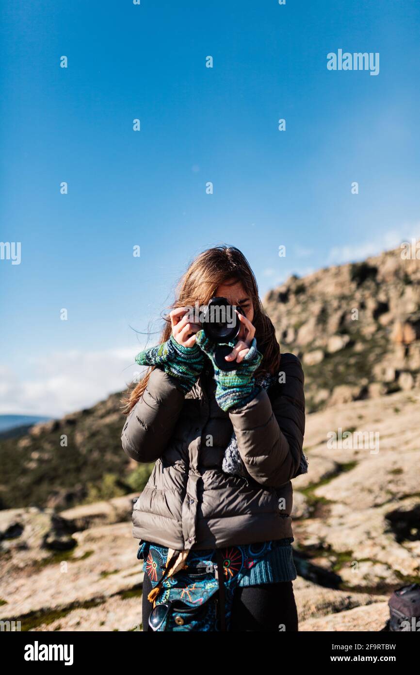 young woman taking photos in the nature Stock Photo - Alamy