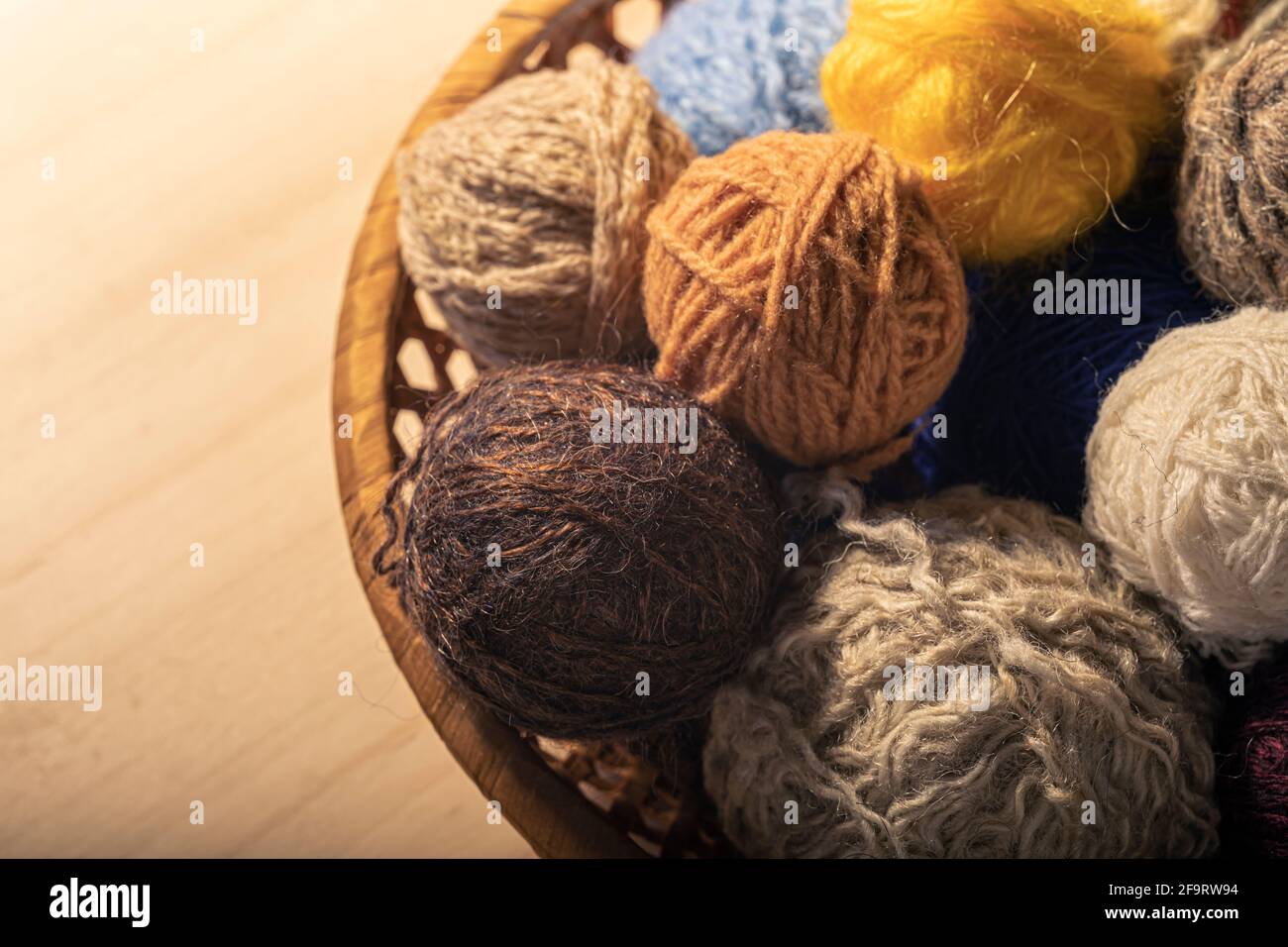 Knitting supplies close-up. Balls of knitting wool in a round