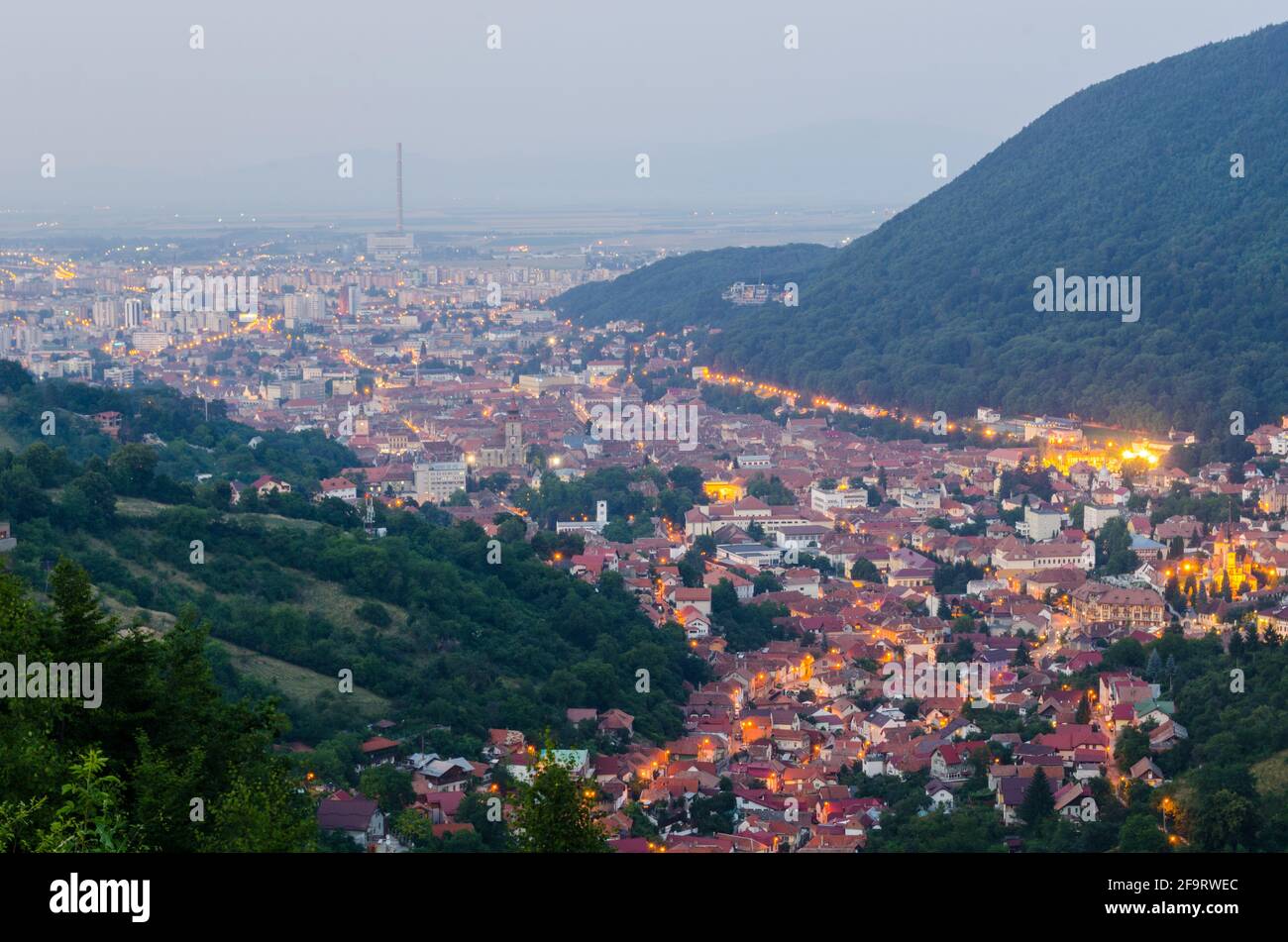 aerial view of romanian city brasov during sunset Stock Photo - Alamy