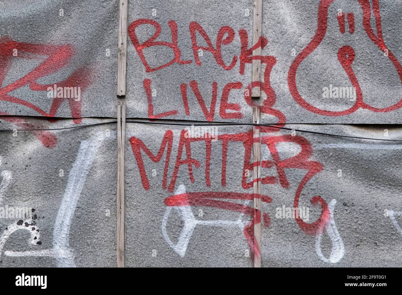 BLM Black Lives Matter and other graffiti in Waterloo on 13th April 2021 in London, United Kingdom. Black Lives Matter is an international human rights movement, originating in the African-American community, that campaigns against violence and systemic racism towards black people. Stock Photo