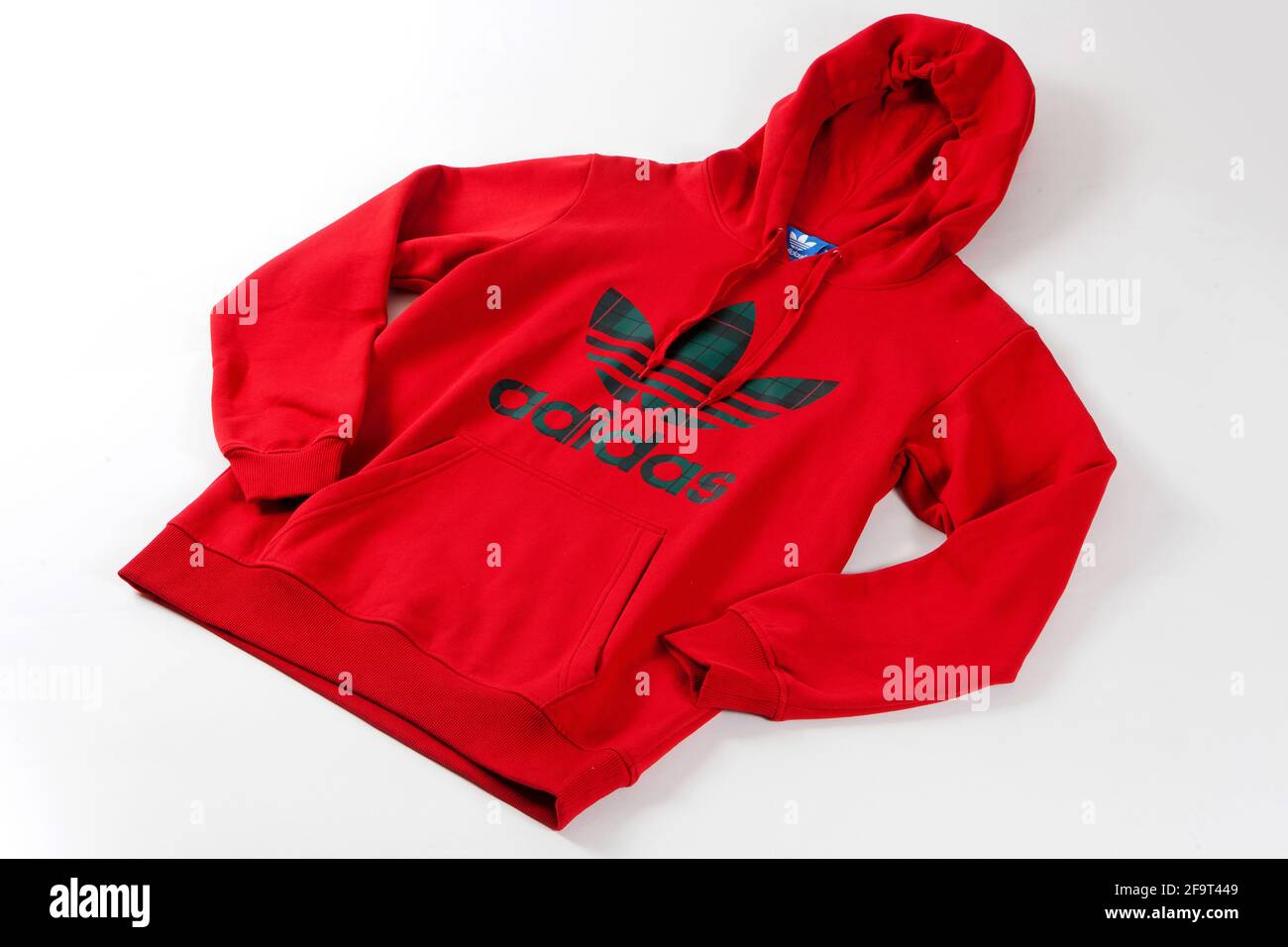 Adidas originals hoodie jumper isolated on white background Stock Photo -  Alamy