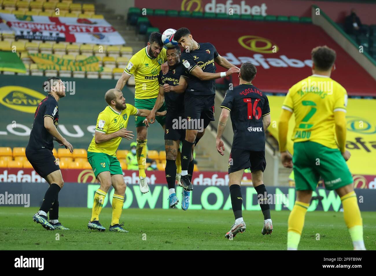 Norwich, UK. 20th April 2021; Carrow Road, Norwich, Norfolk, England, English Football League Championship Football, Norwich versus Watford; Adam Masina of Watford competes for a header with Grant Hanley of Norwich City Credit: Action Plus Sports Images/Alamy Live News Stock Photo