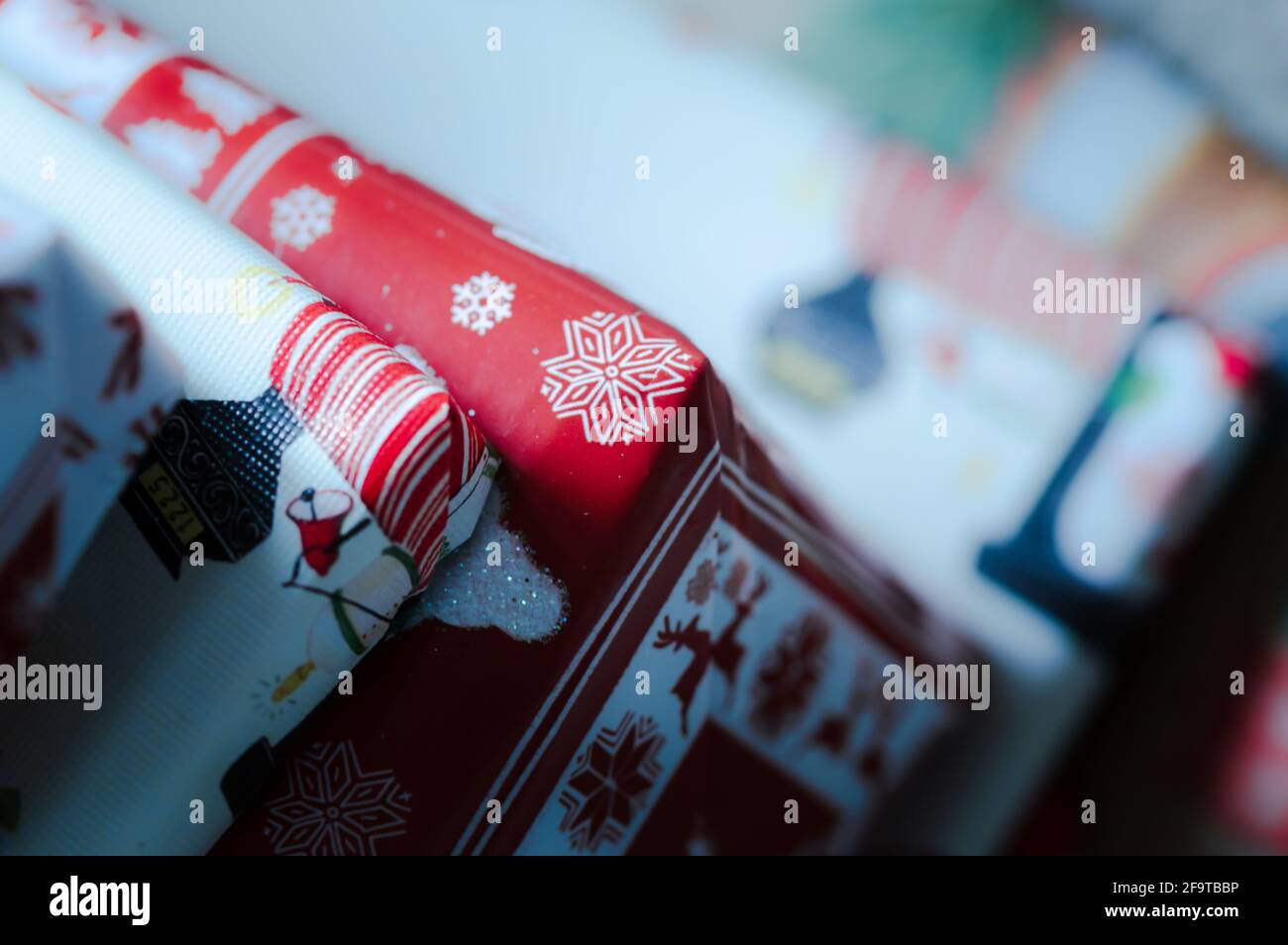 Corner of Wrapped Christmas Presents Stock Photo