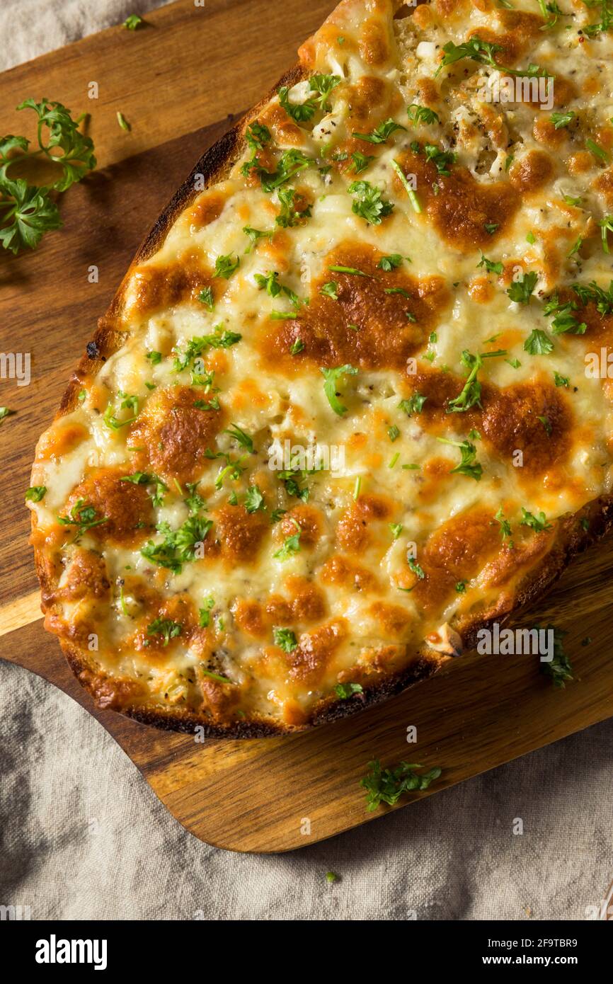 Homemade Cheesy Bread on a French Loaf with Garlic Stock Photo Alamy
