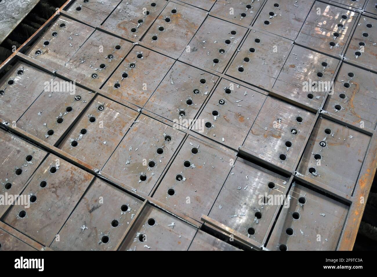 Metal cutting. Cutting of sheet metal using a plasma cutting machine. Stock Photo