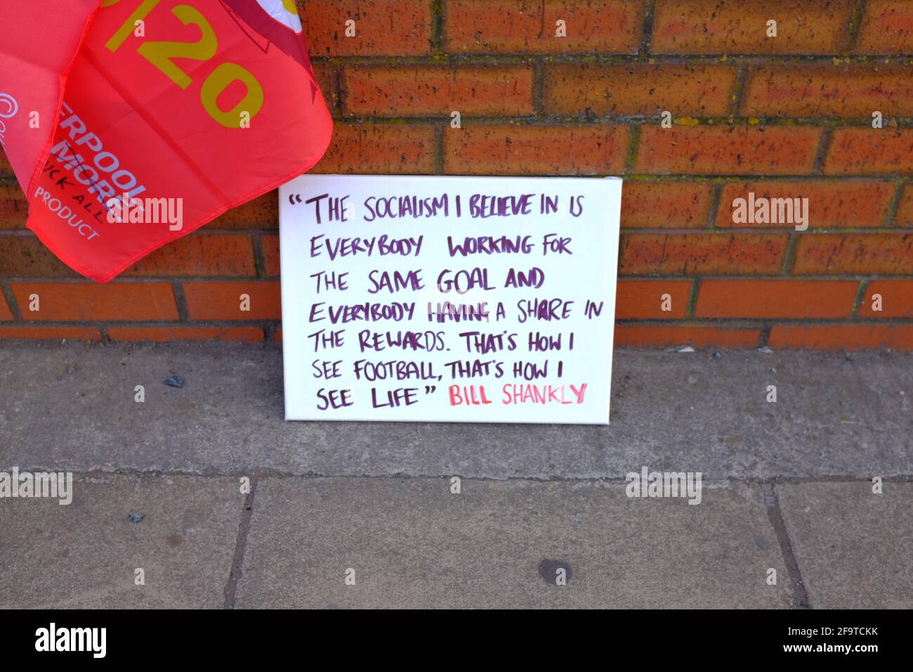 Banners attached to the perimeter  fence of Liverpool Football Club by fans protesting about the clubs intention to join a European Super League. Stock Photo