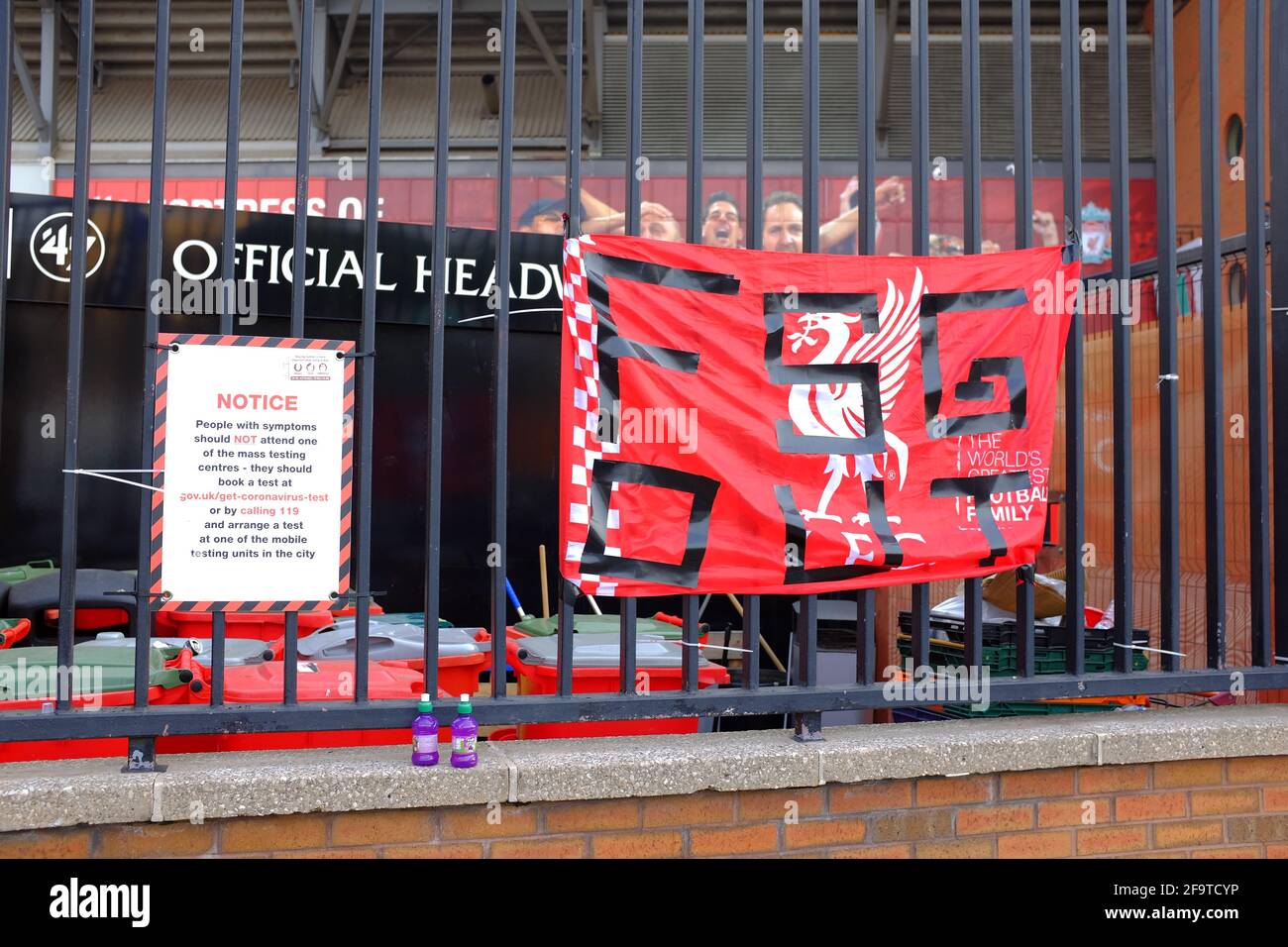 Banners attached to the perimeter  fence of Liverpool Football Club by fans protesting about the clubs intention to join a European Super League. Stock Photo