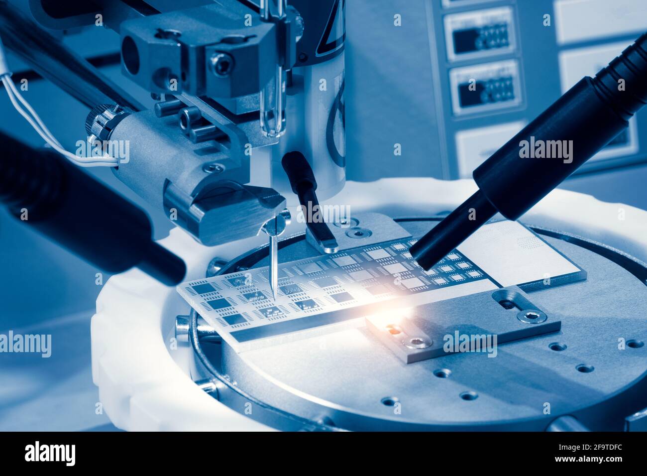 automatic machinery for soldering electronic components. soldering iron