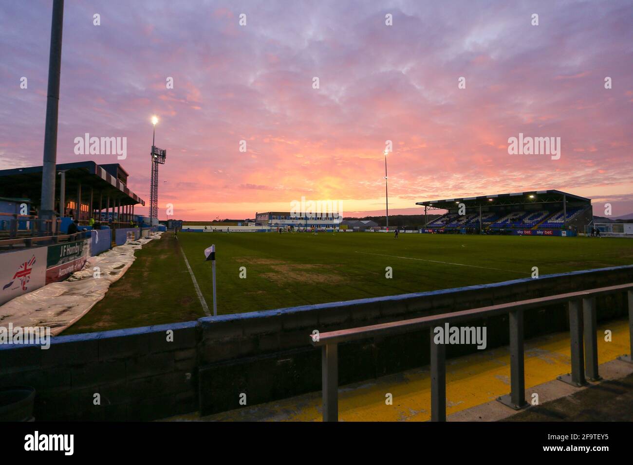 BARROW IN FURNESS, UK. APRIL 20TH a red sunset appaers during the Sky Bet League 2 match between Barrow and Port Vale at the Holker Street, Barrow-in-Furness on Tuesday 20th April 2021. (Credit: Michael Driver | MI News) Credit: MI News & Sport /Alamy Live News Stock Photo