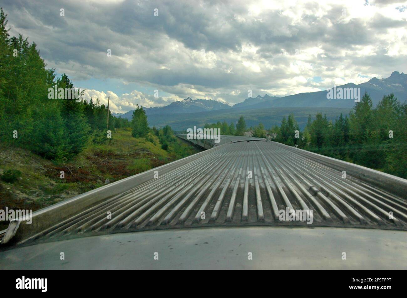 A view of the Rocky mountains in Canada as The Canadian approaches Jasper. The train takes three days to travel between Toronto and Vancouver - Stock Image