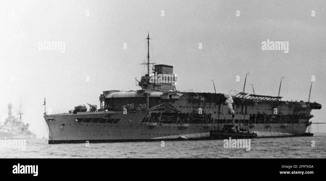 AJAX VINTAGE PICTURE LIBRARY. MAY, 1937. SPITHEAD, ENGLAND. - HMS COURAGEOUS, ORIGINALLY LAUNCHED AS A BATTLE-CRUISER IN 1916, CONVERTED TO AN AIRCRAFT CARRIER IN 1924, BECAME TRAINING CARRIER IN 1938, WAS PRESENT AT THE CORONATION FLEET REVIEW AT SPITHEAD ON 20TH MAY, 1937 FOR KING GEORGE VI. FIRST BRITISH WARSHIP TO BE SUNK BY GERMAN SUBMARINE U-29 IN SEPTEMBER 1939 WHILE ON ANTI-SUBMARINE PATROL OFF IRELAND. PHOTO:AJAX VINTAGE PICTURE LIBRARY REF:50 23 37 Stock Photo