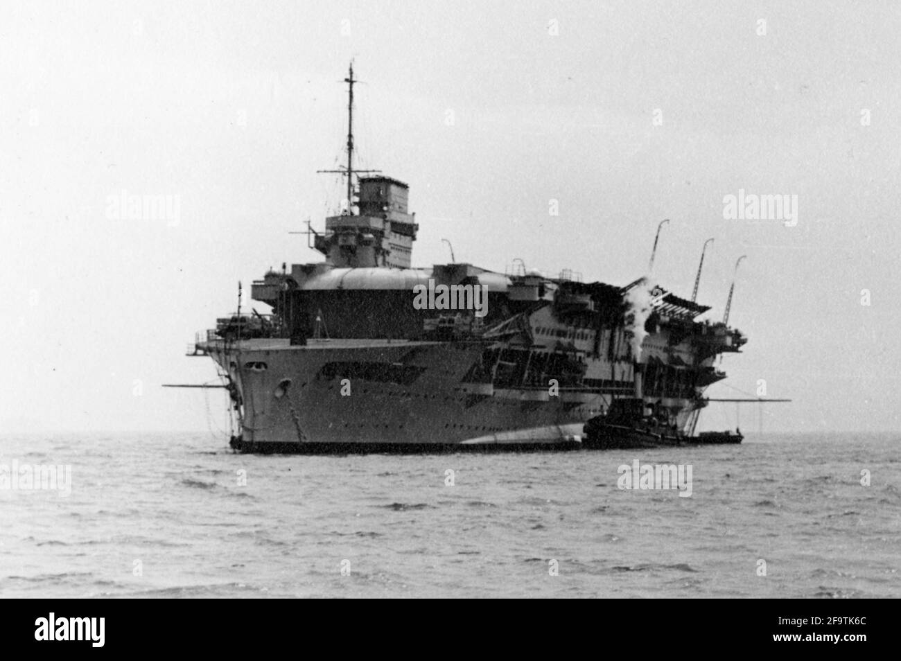 AJAX VINTAGE PICTURE LIBRARY. MAY, 1937. SPITHEAD, ENGLAND. - HMS COURAGEOUS, ORIGINALLY LAUNCHED AS A BATTLE-CRUISER IN 1916, CONVERTED TO AN AIRCRAFT CARRIER IN 1924, BECAME TRAINING CARRIER IN 1938, WAS PRESENT AT THE CORONATION FLEET REVIEW AT SPITHEAD ON 20TH MAY, 1937 FOR KING GEORGE VI. FIRST BRITISH WARSHIP TO BE SUNK BY GERMAN SUBMARINE U-29 IN SEPTEMBER 1939 WHILE ON ANTI-SUBMARINE PATROL OFF IRELAND. PHOTO:AJAX VINTAGE PICTURE LIBRARY REF:50 23 39 Stock Photo