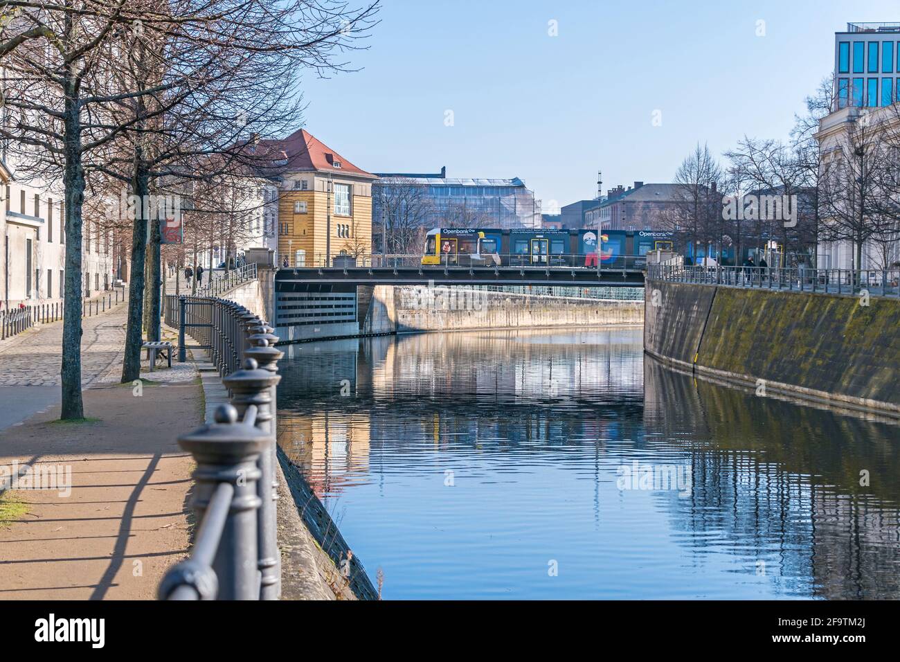 Berlin, Germany - March 1, 2021: Banks of the Berlin-Spandau shipping canal with the Sandkrug bridge and the tram Stock Photo
