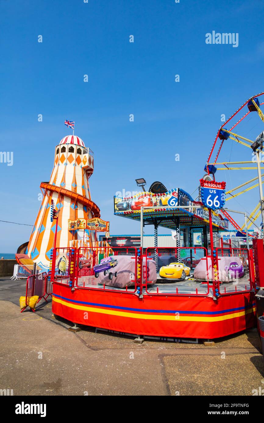 deserted due to covid 19. Fun Fair ride at Rainbow park Amusements, Hunstanton, Norfolk, England. Helter Skelter. Big wheel: route 66 car ride. Stock Photo