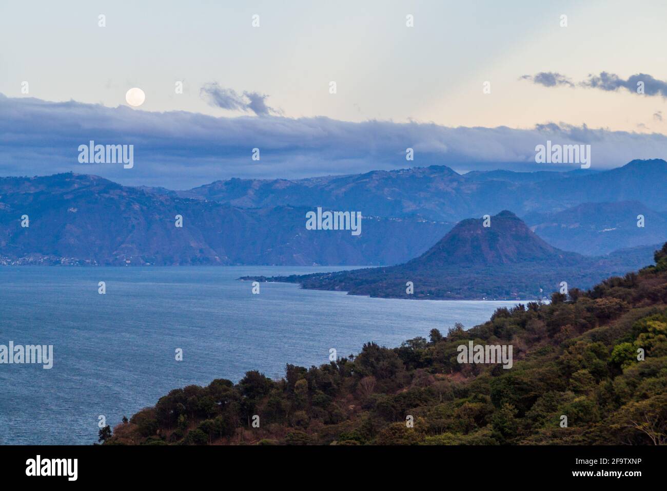 View of Atitlan lake and Cerro de Oro volcano, Guatemala Stock Photo