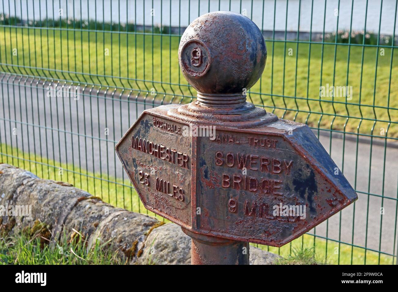 Milepost sign on Rochdale Canal, Todmorden Stock Photo