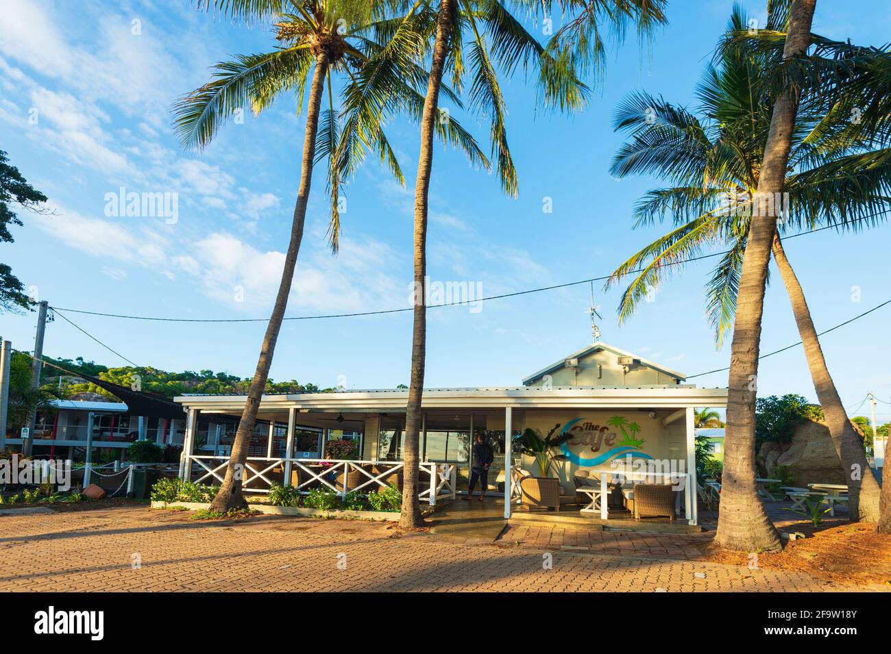 Café in tropical setting by palm trees by the beach, Horseshoe Bay, Bowen, Queensland, QLD