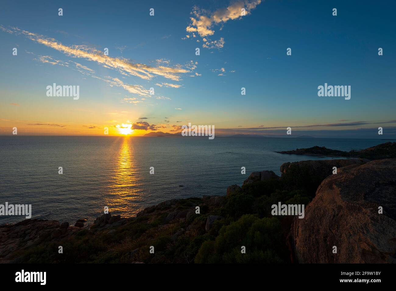 Moody sunrise at Horseshoe Bay, Bowen, Queensland, QLD, Australia Stock