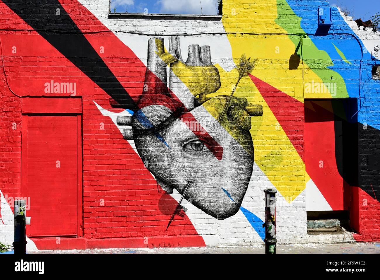 Local business in Shoreditch with street art decor.