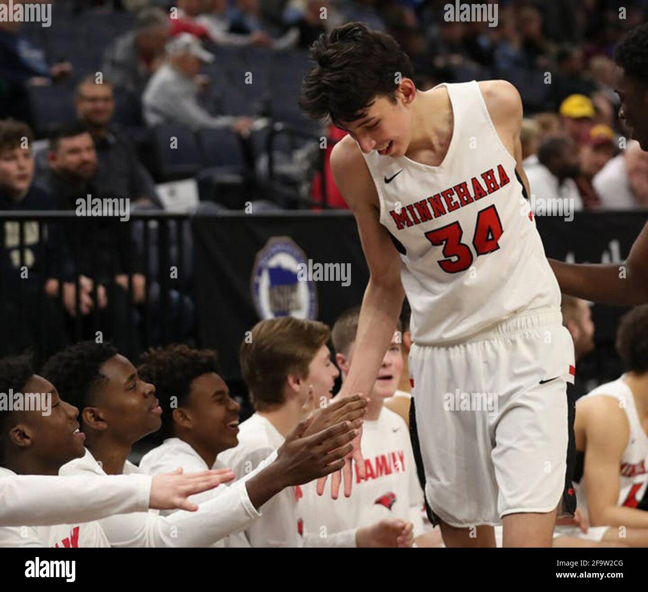 USA. 20th Apr, 2021. Chet Holmgren celebrates on the Minnehaha High School bench en route to the Minnesota Class 2A title. The 7-foot, 190-pound high school prospect has taken the recruiting circuit by storm and rocketed up the 2021 rankings. (Photo by Shari L. Gross/Minneapolis Star Tribune/TNS/Sipa USA) Credit: Sipa USA/Alamy Live News Stock Photo