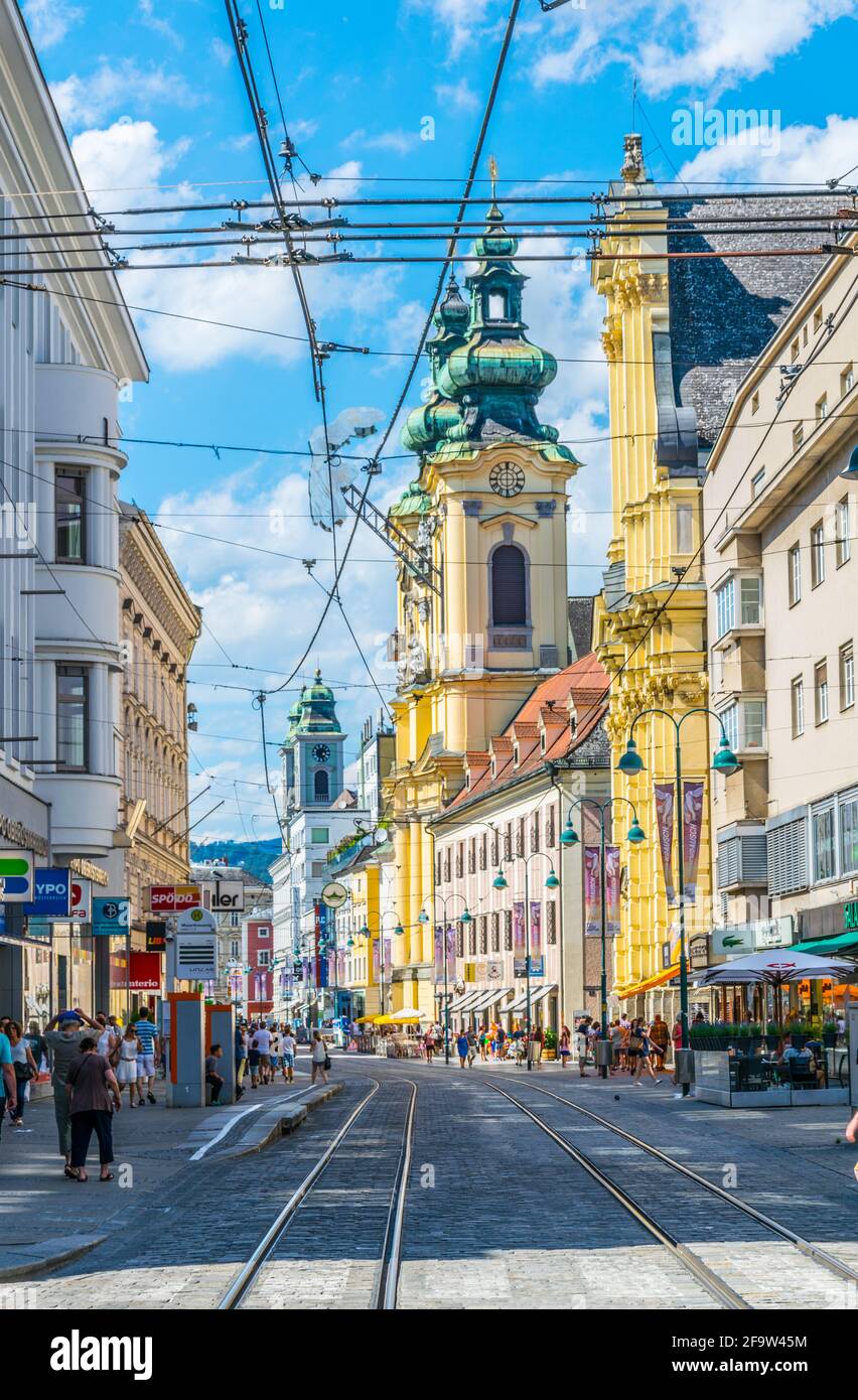 LINZ, AUSTRIA, JULY 30, 2016: View of the Ursulinenkirche church situated on the Landstrasse street in the Austrian city Linz. Stock Photo