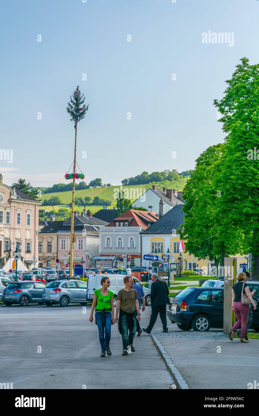 KLOSTERNEUBURG, AUSTRIA, MAY 26, 2016: People are strolling ona street in klosterneuburg, Austria. Stock Photo