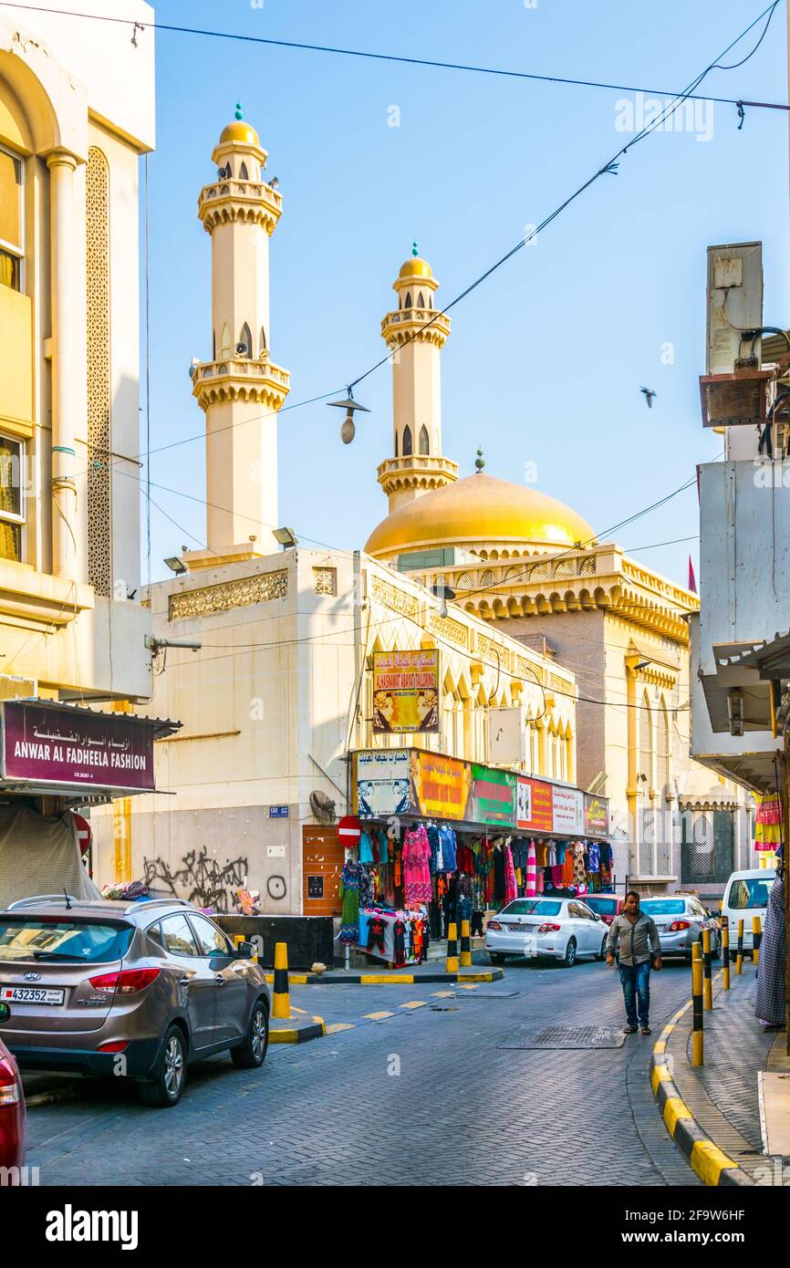 MANAMA, BAHRAIN, OCTOBER 23, 2016: View of a mosque situated in a narrow street near the Bab al Bahrain souq in Manama, the capital of Bahrain Stock Photo