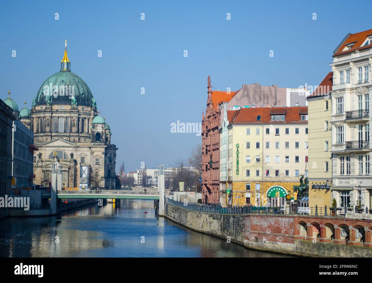 BERLIN, GERMANY, MARCH 12, 2015: view of the riverside of spree river in berlin with famous berlin cathedral at the far end. Stock Photo