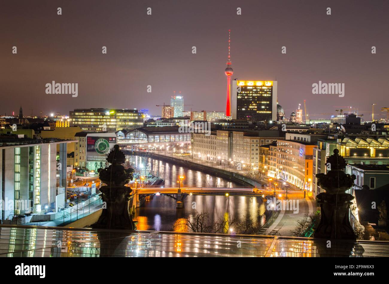 BERLIN, GERMANY, MARCH 12, 2015: night view of spree river and fernsehturm in berlin taken from the top of reichstag building. Stock Photo