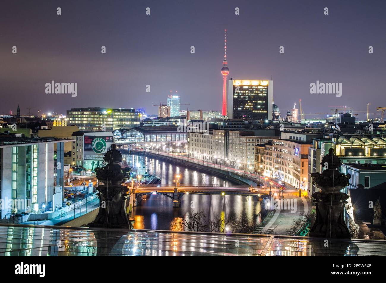 BERLIN, GERMANY, MARCH 12, 2015: night view of spree river and fernsehturm in berlin taken from the top of reichstag building. Stock Photo