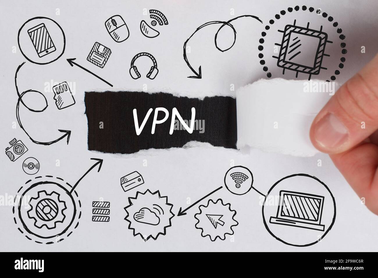 Business, Technology, Internet and network concept. Young businessman working on a virtual screen of the future and sees the inscription: VPN Stock Photo