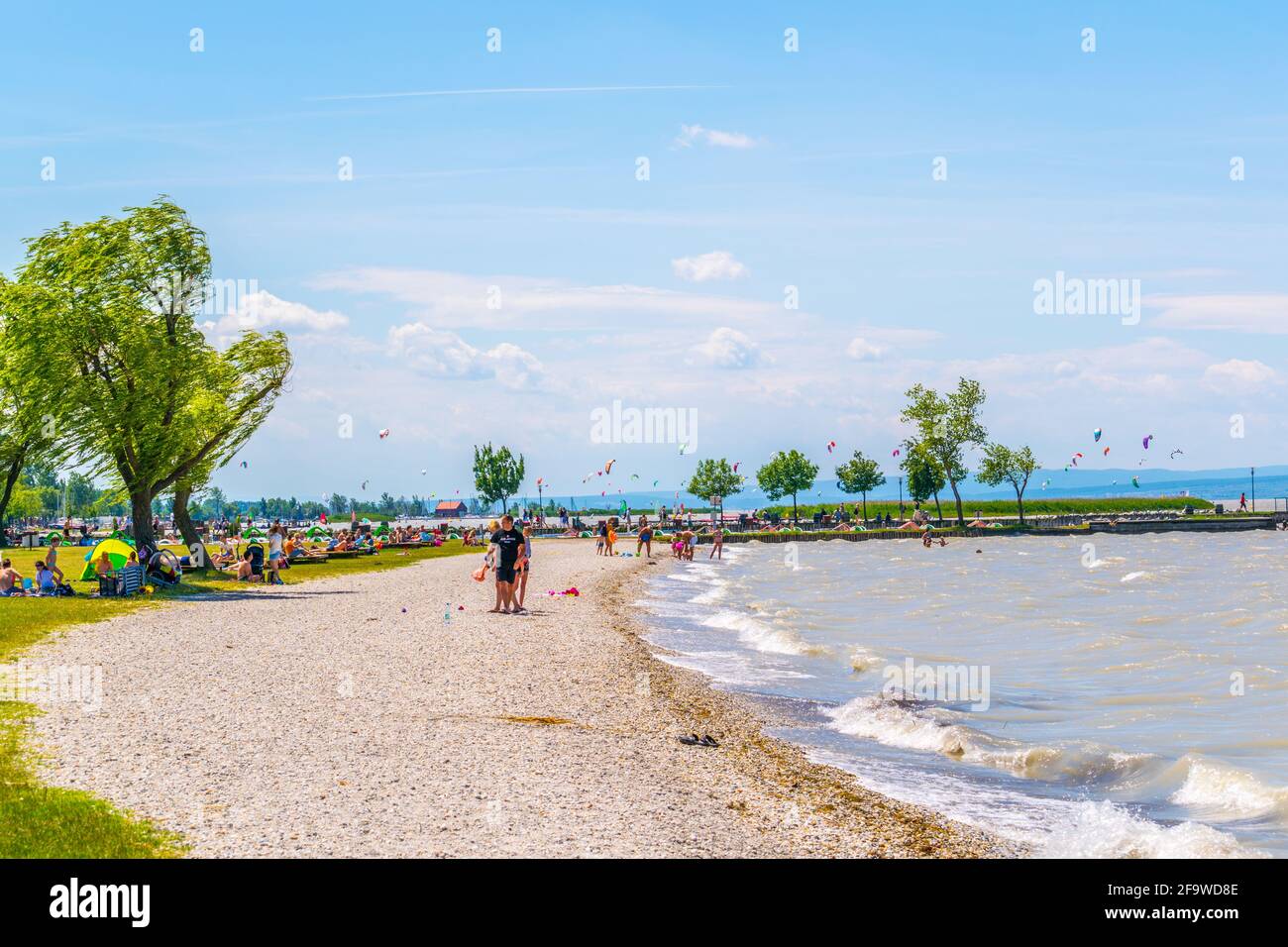 PODERSDORF, AUSTRIA, JULY 9, 2016: People are enjoying day on a beach in Podersdorf am See in Austria. Stock Photo