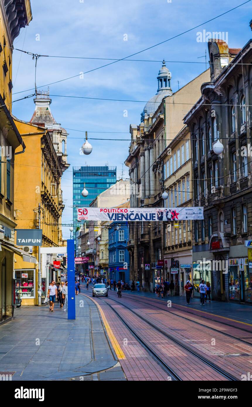 ZAGREB, CROATIA, JULY 28, 2015: people are walking through ilica street in the croatian capital zagreb during rainy summer day. Stock Photo