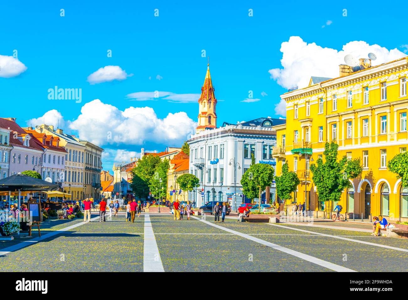 VILNIUS, LITHUANIA, AUGUST 14, 2016: People are strolling through Rotuses aikste - the town hall square of the lithuanian capital Vilnius, Lithuania Stock Photo