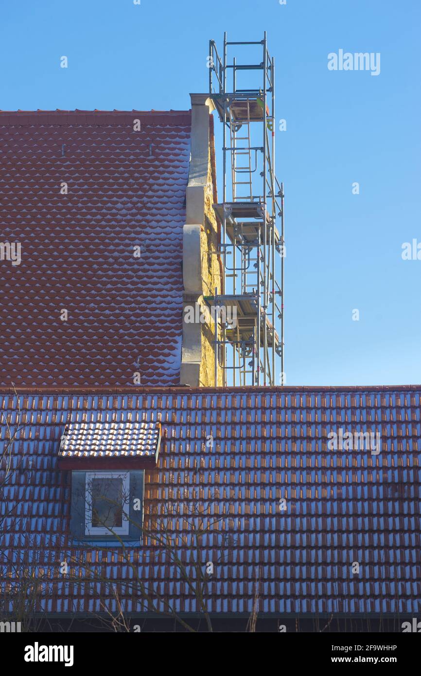 Vertical shot of a building under construction Stock Photo - Alamy