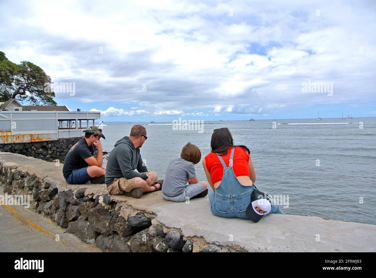 hawaii tourists enjoy the  pacific ocean views  from Kaanapali beach in the small  historic town of Lahaina Maui usa Stock Photo